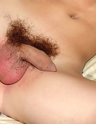 Longhaired boy with very hairy pubis rubs one out